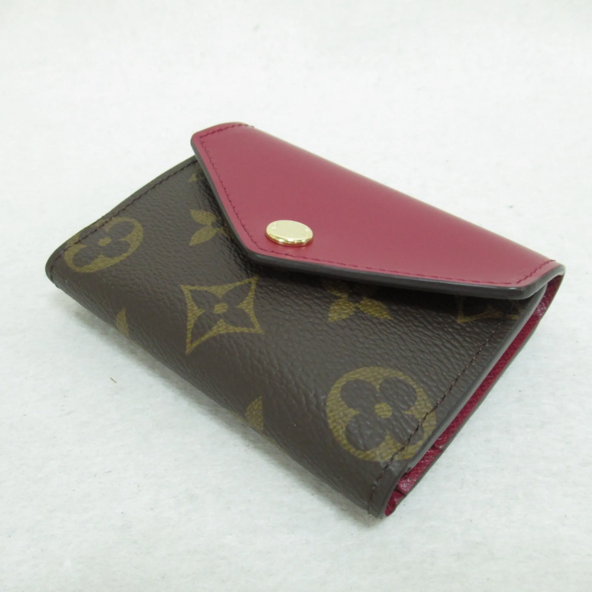 Trendy Inspired Louis Vuitton Portefeiulle Zoe Tri-fold Wallet Brown Bordeaux System Fuschia Monogram Pvc Coated Canvas M62932